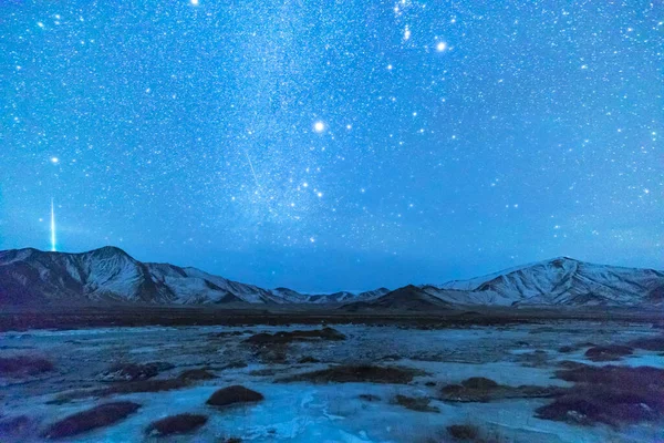 beautiful landscape with mountains and stars