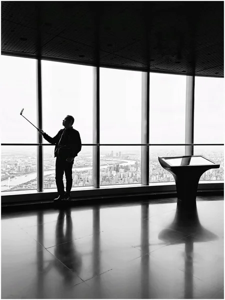 silhouette of a man in a black and white photo