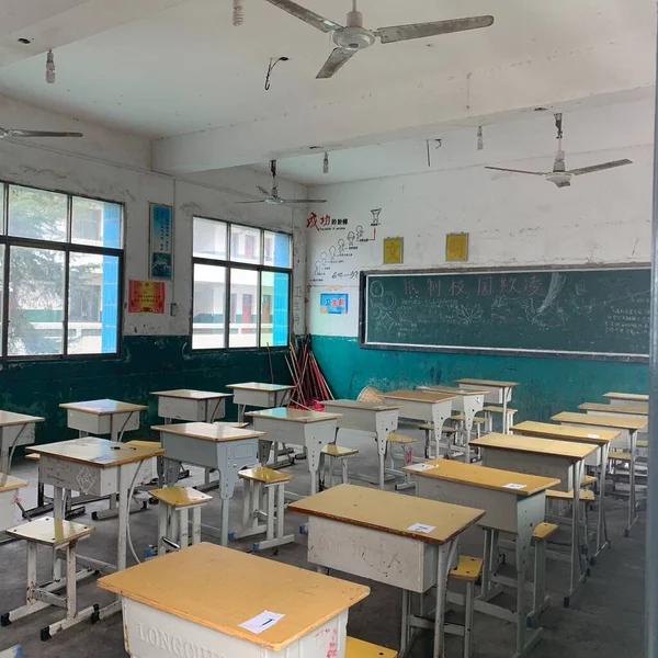 school classroom with a large window