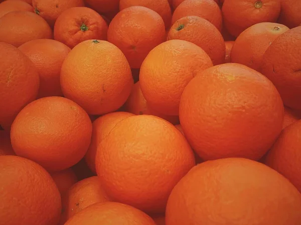 fresh ripe oranges on a white background