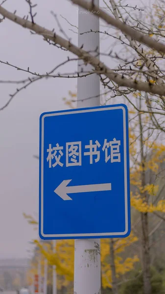 street sign with a lot of people signs