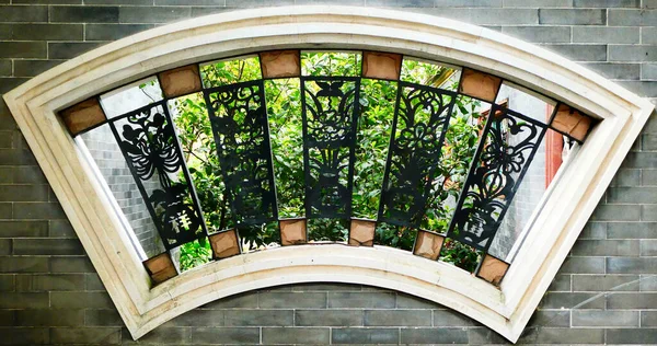 window with windows and green leaves