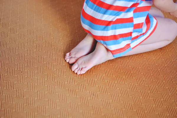 baby feet on the floor