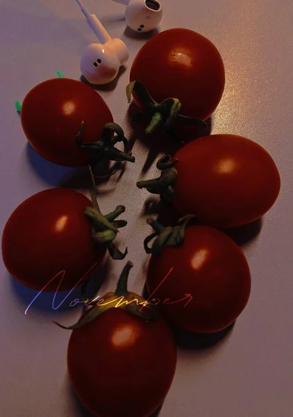 tomatoes and red tomato on a white background