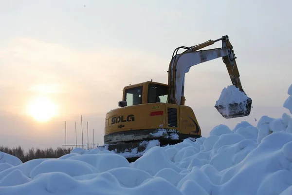 snow-covered construction of the winter landscape