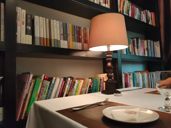 library interior with books and book