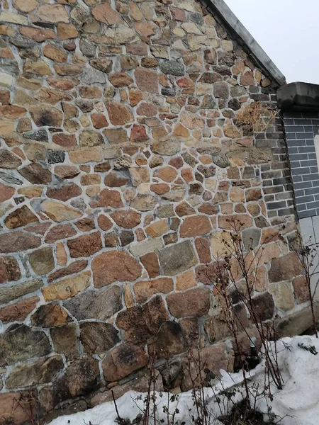 old brick wall with a window