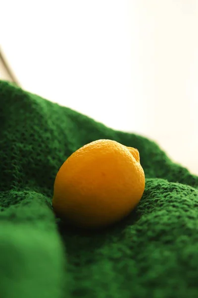 fresh green lemon on a white background