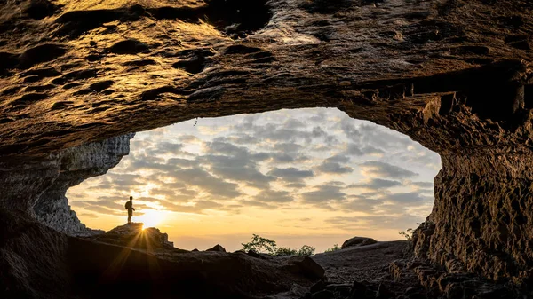 silhouette of a man in the mountains