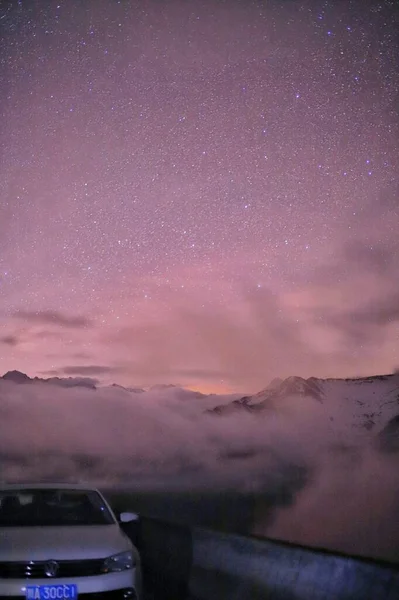 beautiful night sky with stars and clouds