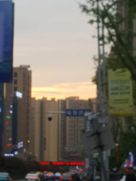 blurred city skyline with skyscrapers and buildings