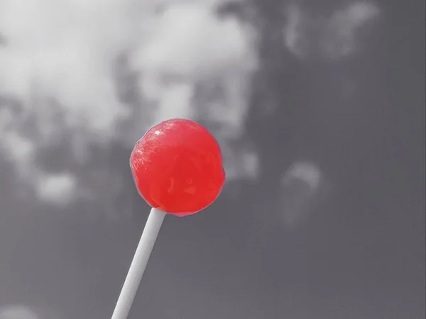 red lollipop on a stick