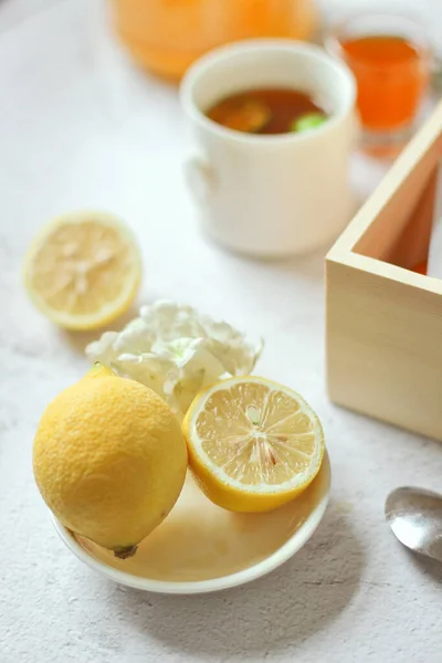 lemon tea with a cup of coffee on a white background