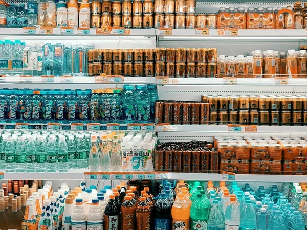 empty shelves with bottles of wine in the store