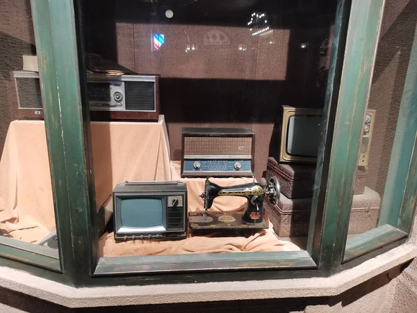 old tv box with a telephone