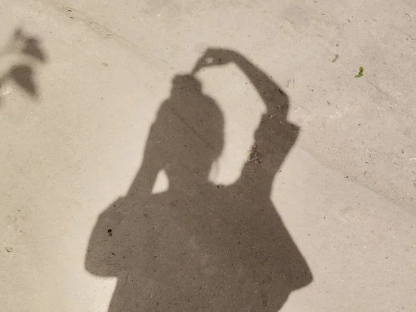 silhouette of a woman with a white background