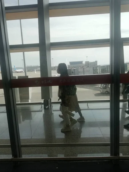 silhouette of a man in a airport