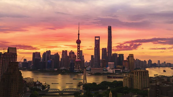 shanghai skyline at sunset, new york city, usa