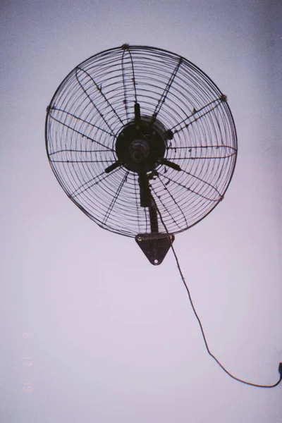 modern electric fan on the roof of the house