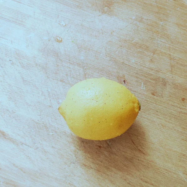 fresh yellow lemon on a white background