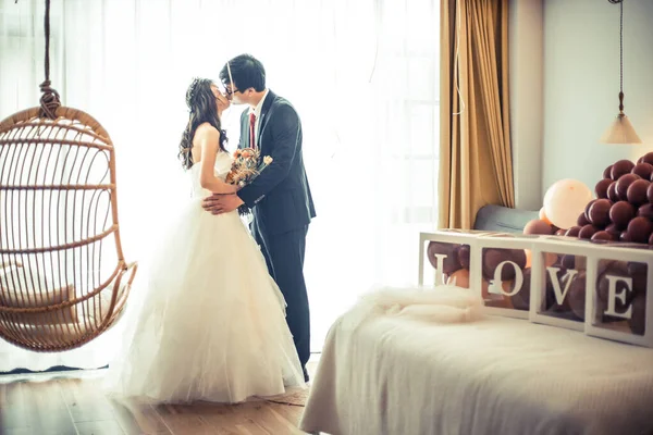 beautiful bride and groom in the room