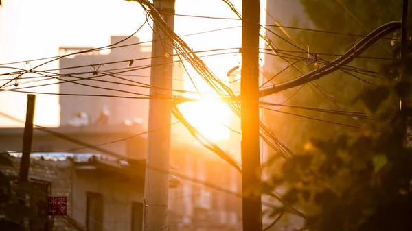 a vertical shot of a beautiful sunset on a street