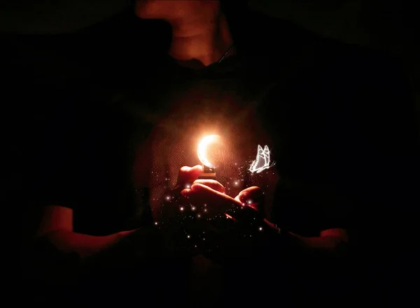 man with a burning candle in the hands of a woman
