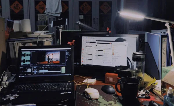 computer monitor with a typewriter and a laptop