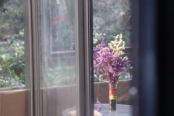 beautiful flowers in the window