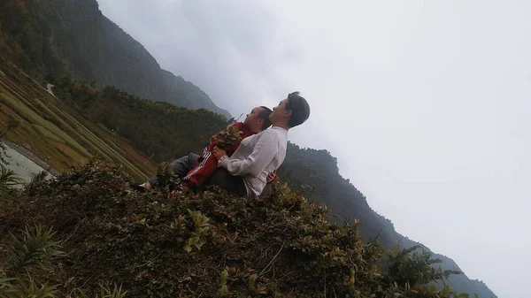 young couple in love on the mountain