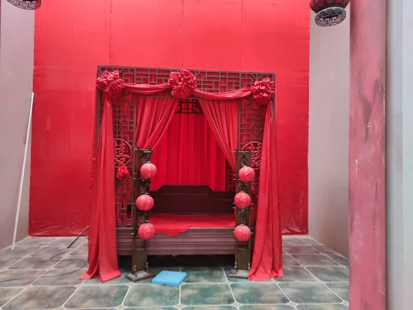 red curtain with a white curtains