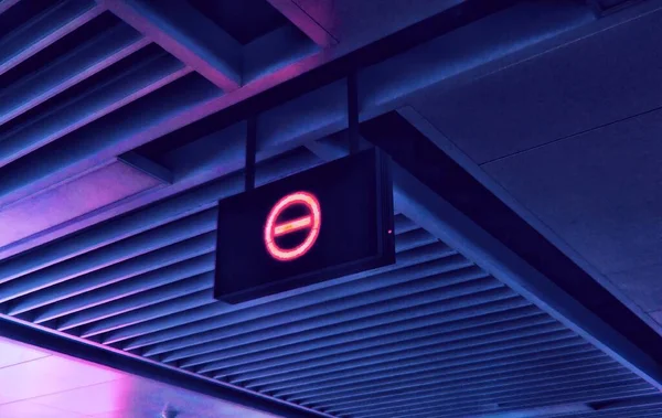 modern building with a red and blue neon lights