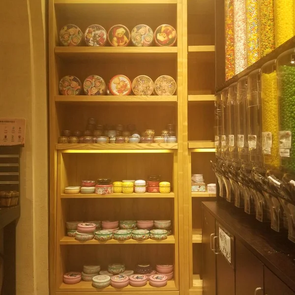 shelves with different types of spices in a store