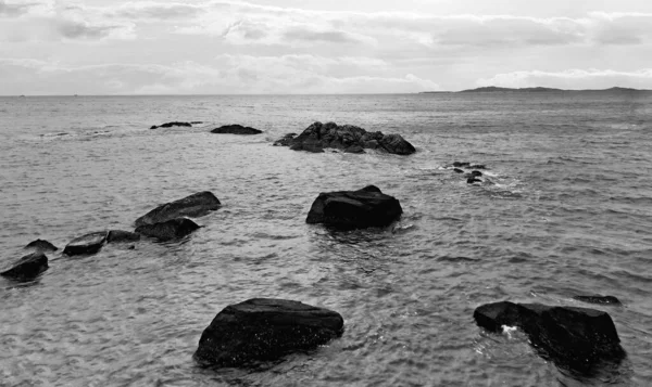 black and white sea coast