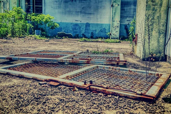 old rusty metal roof and concrete floor