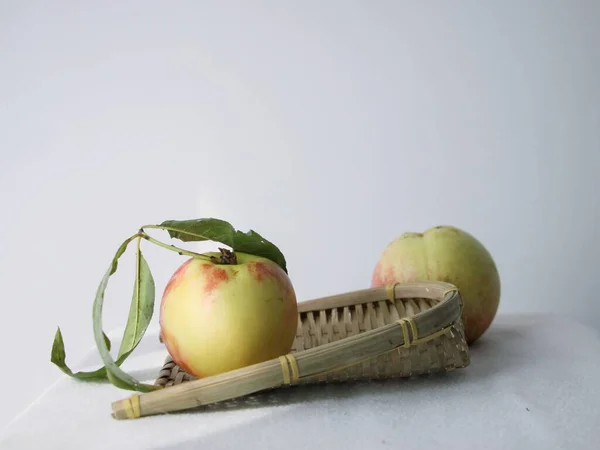 ripe apples on a white background