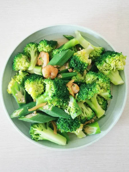 fresh broccoli salad with vegetables and herbs