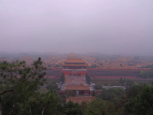 the forbidden city in the fog