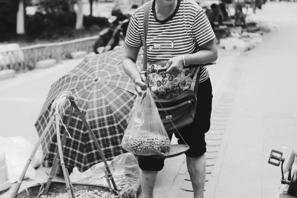 young woman with basket of vegetables and fruits