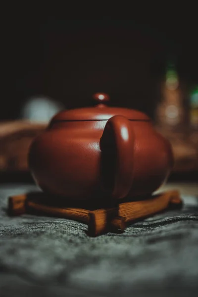 tea cup with red hot chocolate on wooden table
