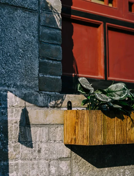 old stone wall with a metal handle