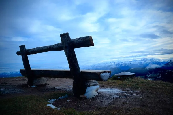 wooden cross on the background of the mountain