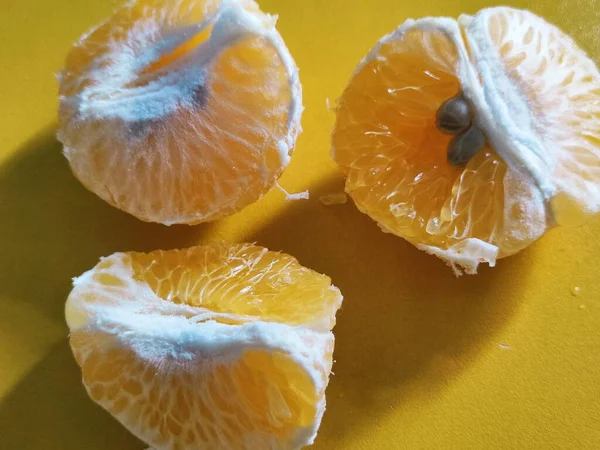 fresh ripe orange on a black background