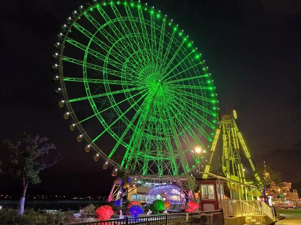 ferris wheel in amusement park, london, united states