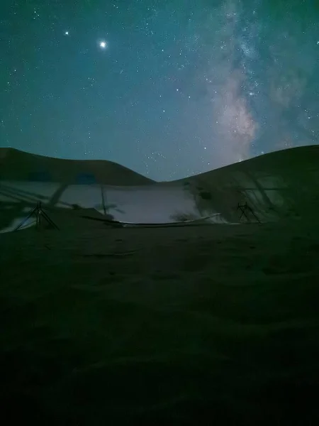 beautiful night sky with stars and mountains