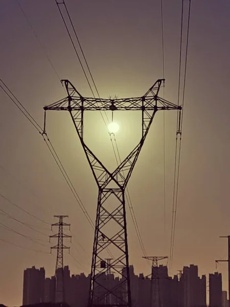high voltage power lines and electric poles