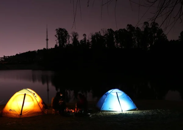 camping tent on the background of the river