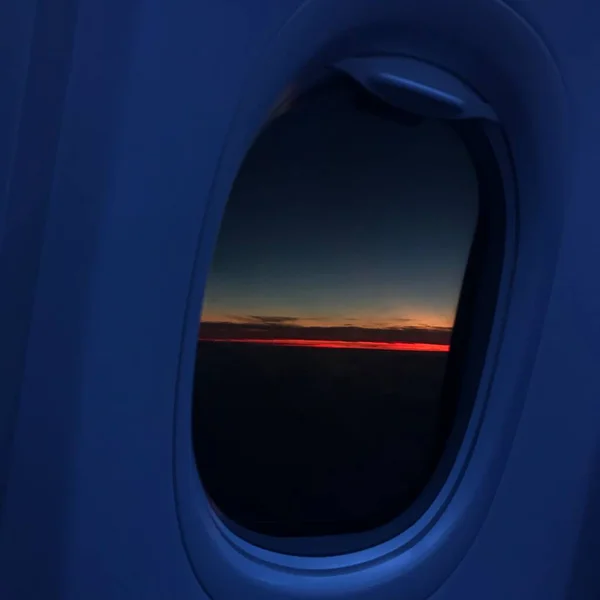 airplane window in the sky