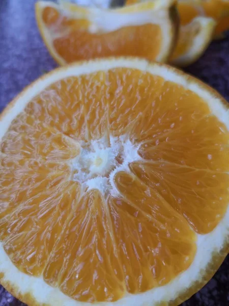 fresh sliced orange on a black background