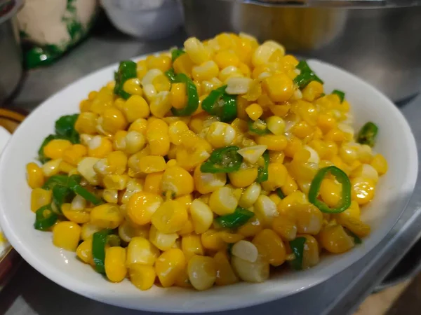 corn and peas in a bowl